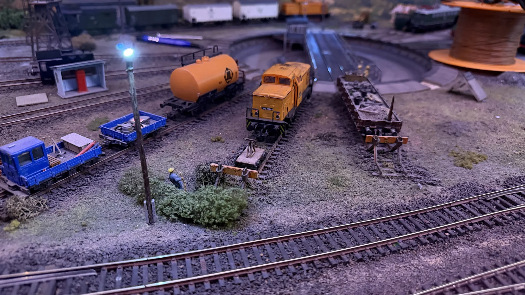 Freight wagons and maintenance vehicles after dark