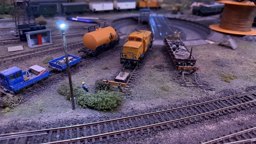 Freight wagons and maintenance vehicles after dark