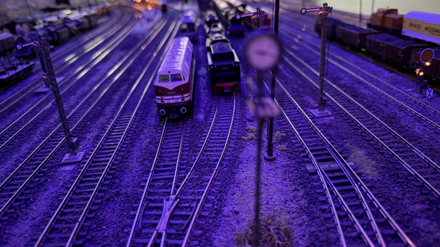 Station tracks under blue evening lighting