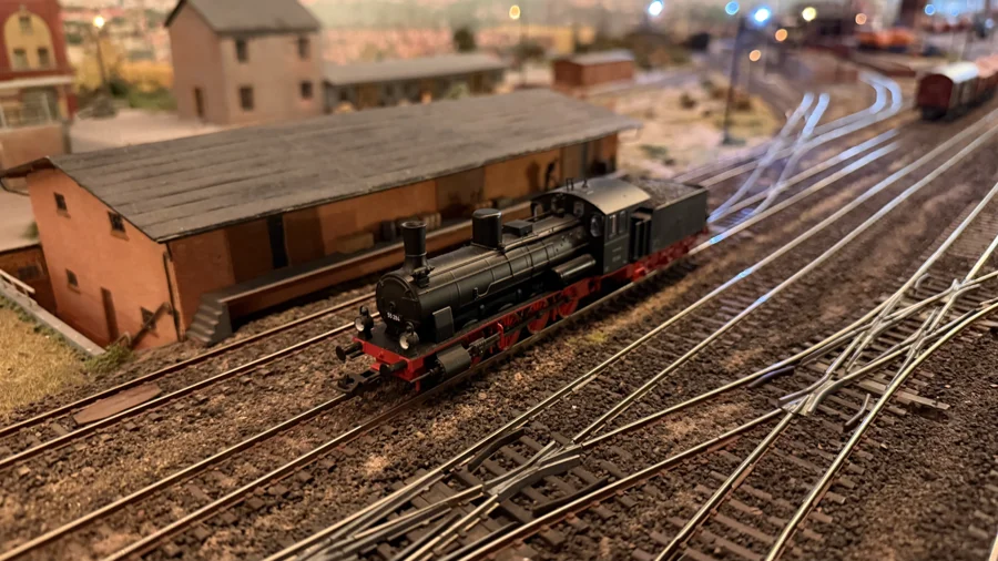 Brick engine shed and converging railway tracks