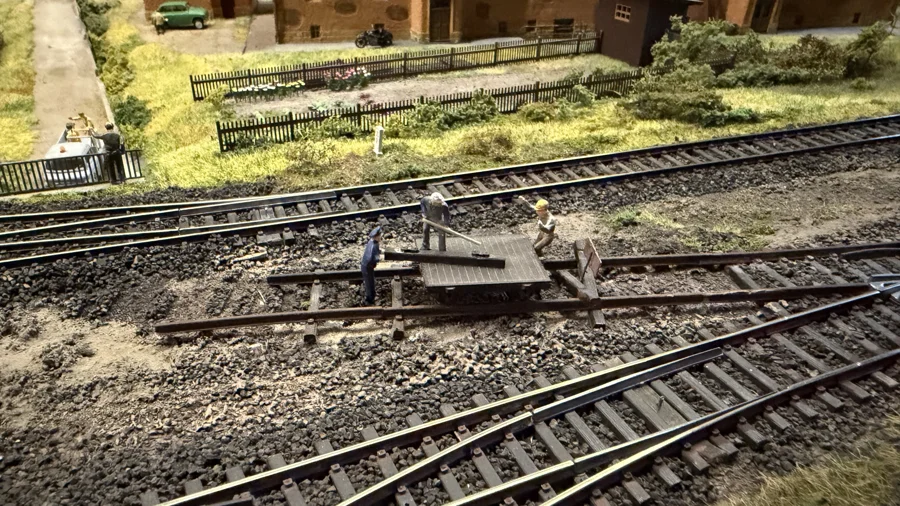 Trackside equipment beside a miniature building