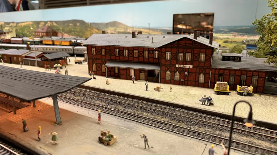 Station building and waiting passengers